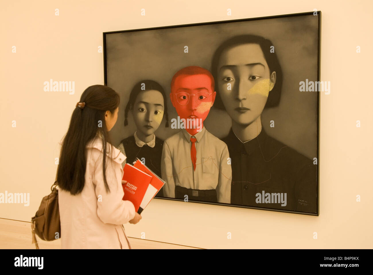 Looking at Art UK. Saatchi new Art Gallery The Duke of York Headquarters Chelsea London. 'Big Family' by Chinese artist Zhang Xiaogang HOMER SYKES Stock Photo