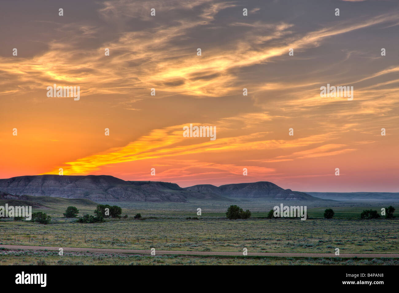 Farmland in the Big Muddy Badlands at sunset, Southern Saskatchewan, Canada. Stock Photo