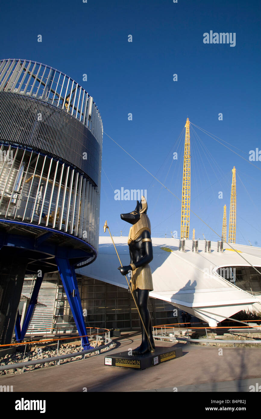 O2 Arena, entrance London Millennium Dome. Morning Blue sky Statue of Anubis - Tutankhamun exhibition  Vertical 77499 London-O2 Stock Photo