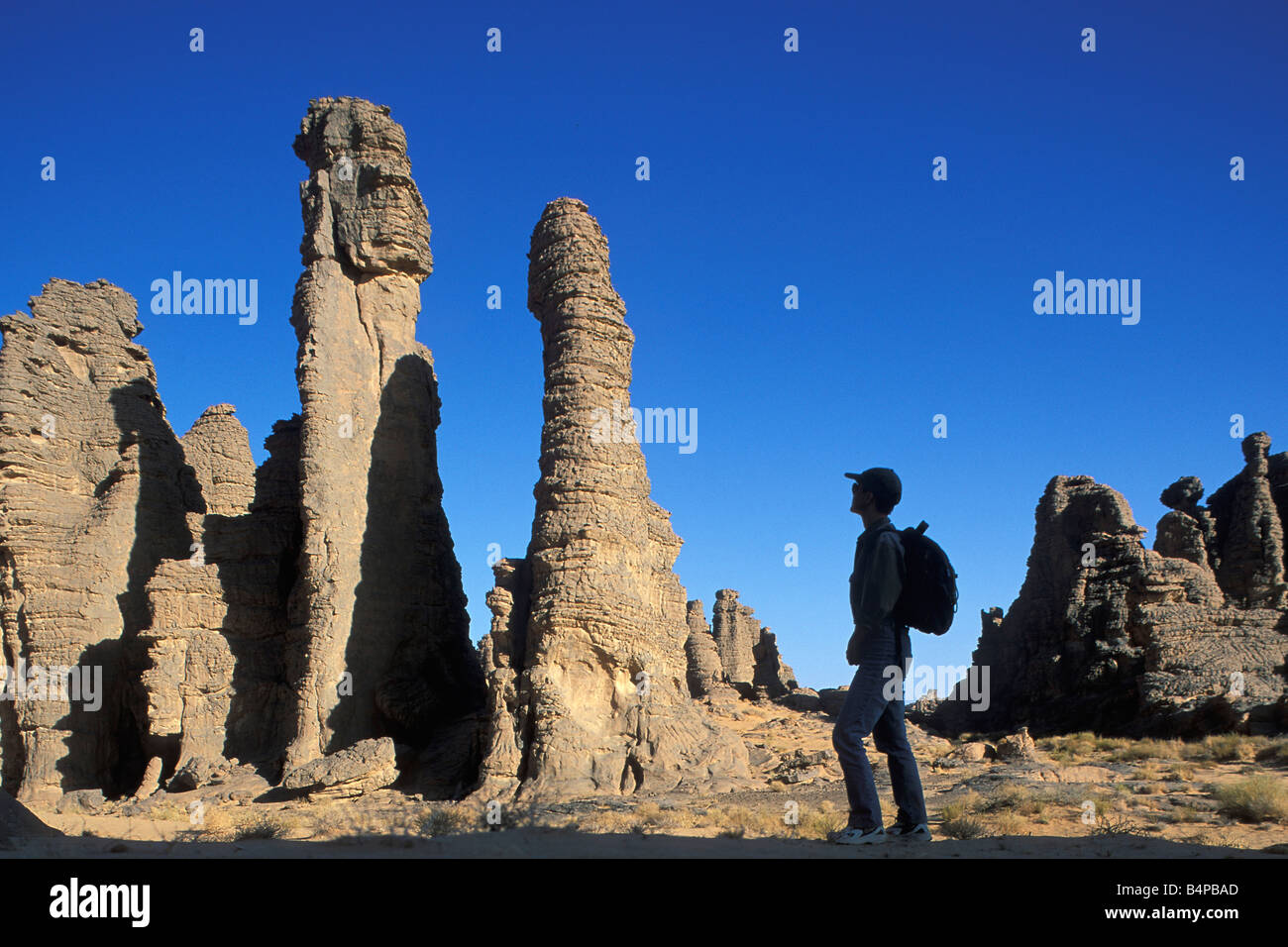 Algeria Djanet National Park Tassili n Ajjer UNESCO World Heritage site Tourist hiking Sahara desert Stock Photo