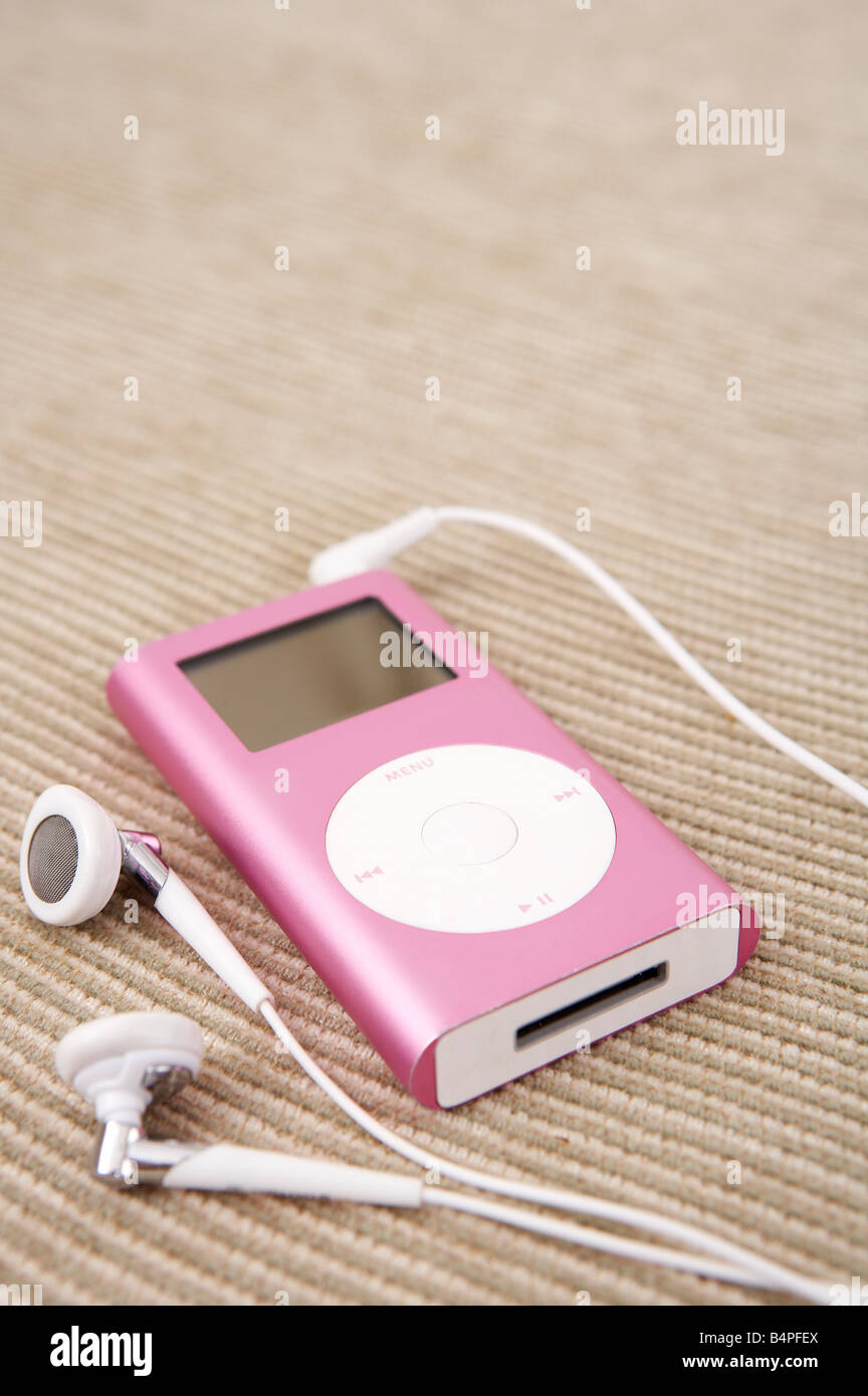 Headphones connected to ipod close up Stock Photo Alamy