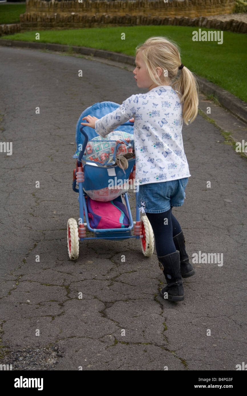 Dolly in pram hi-res stock photography and images - Alamy