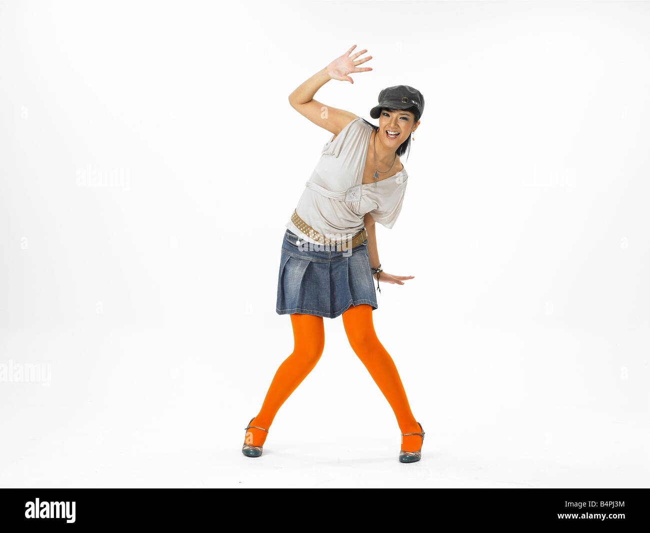 Young woman dancing interior skirt hi-res stock photography and images ...