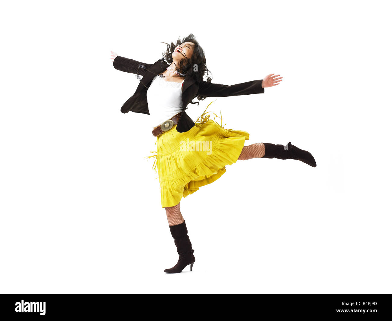 Young woman with arms raised against white background Stock Photo - Alamy
