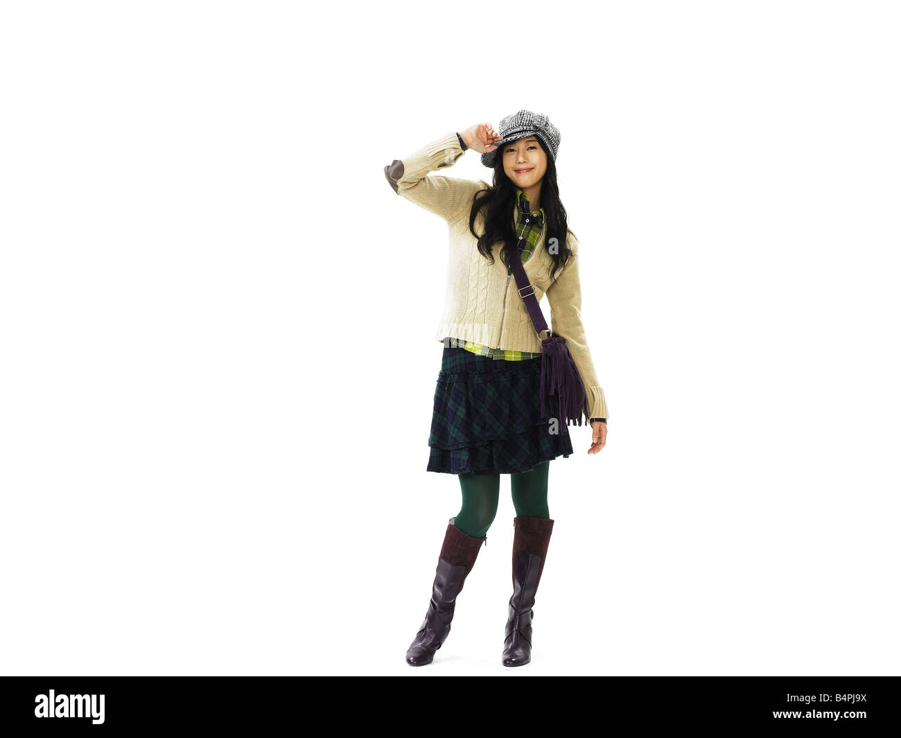 Young woman carrying shoulder bag, smiling, portrait Stock Photo Alamy