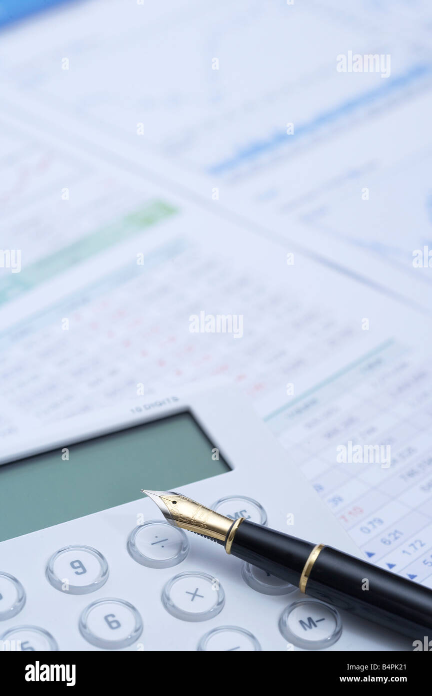 Financial paper with fountain pen Stock Photo - Alamy