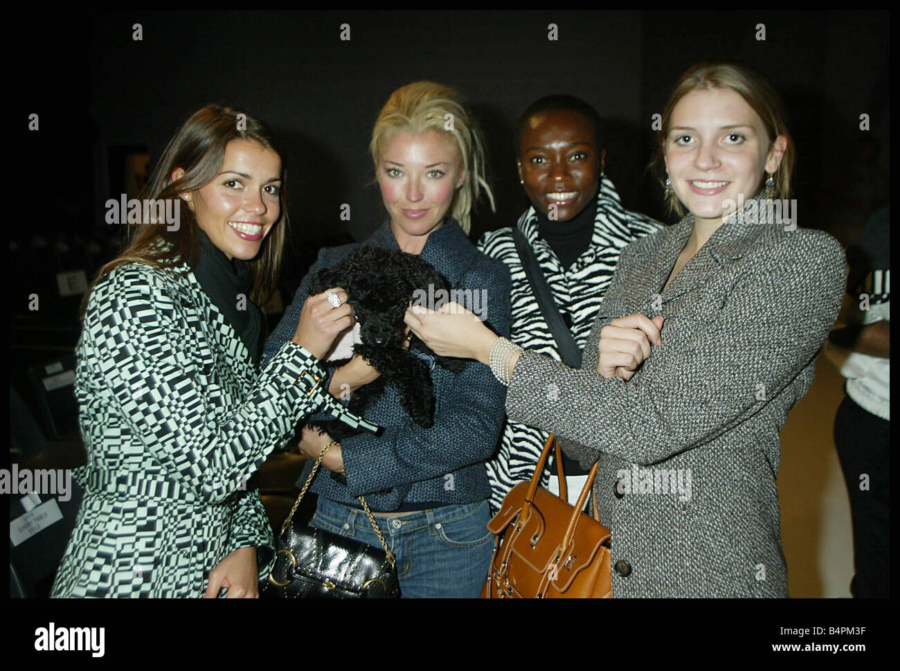 London Fashion Week September 2003 Daily Mirror journalists the 3am girls Tamara Beckwith and her dog Wearing zebra print coats Stock Photo