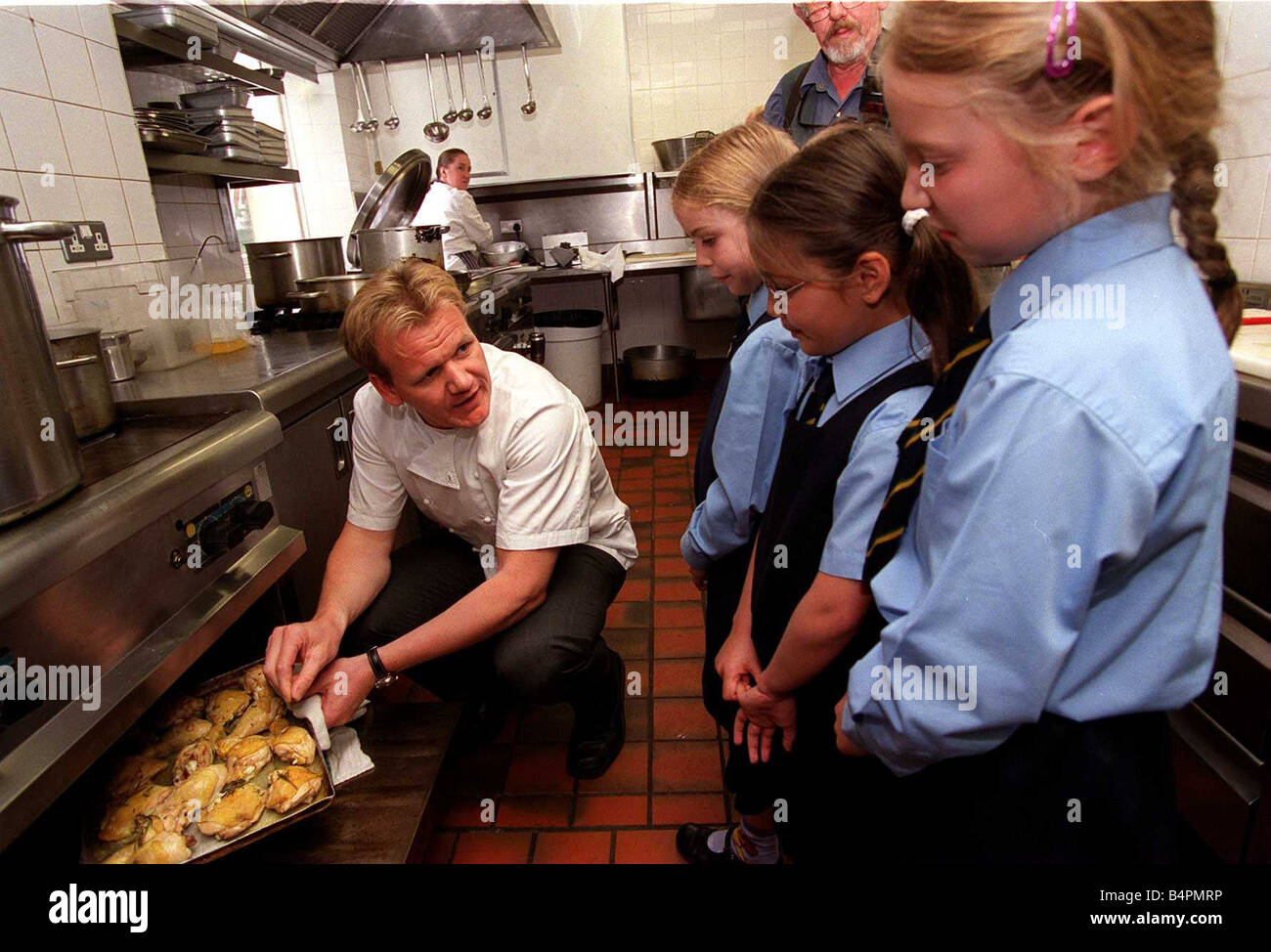 Gordon Ramsay at Amarylis restaurant with young girls June 2001 Stock Photo