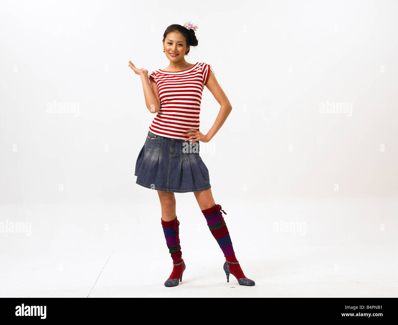 Woman wearing mini skirt hi-res stock photography and images - Alamy