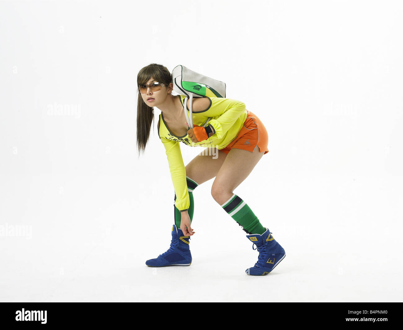 Young woman carrying shoulder bag Stock Photo Alamy