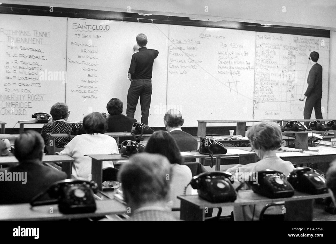 The results of the racing at Saint Cloud in Paris are marked on the board at Ladbrokes betting