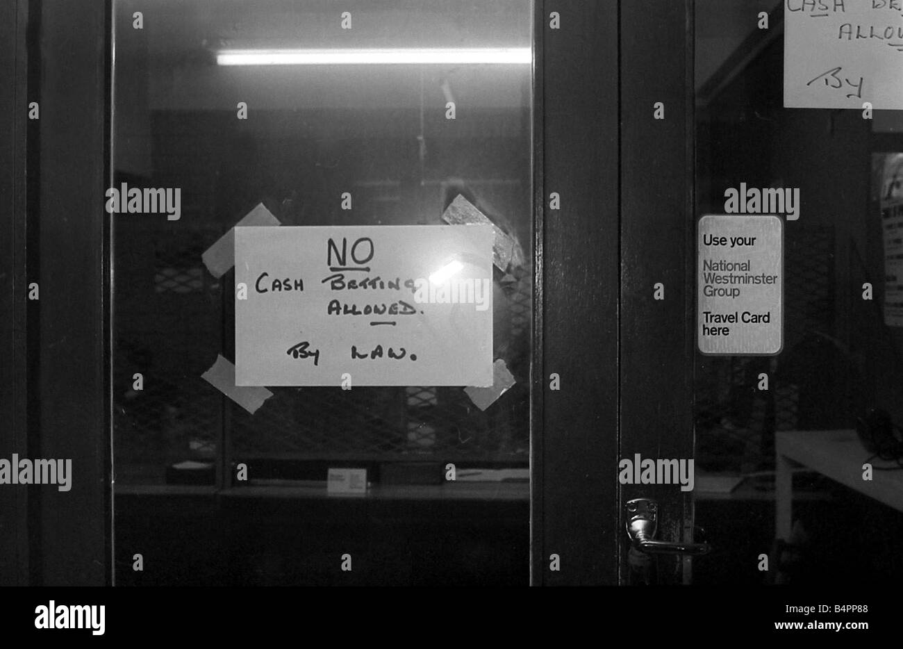 A sign on the door forbidding cash bets at a Sidney Glanz betting shop in the Isle of Man June 1969 Stock Photo