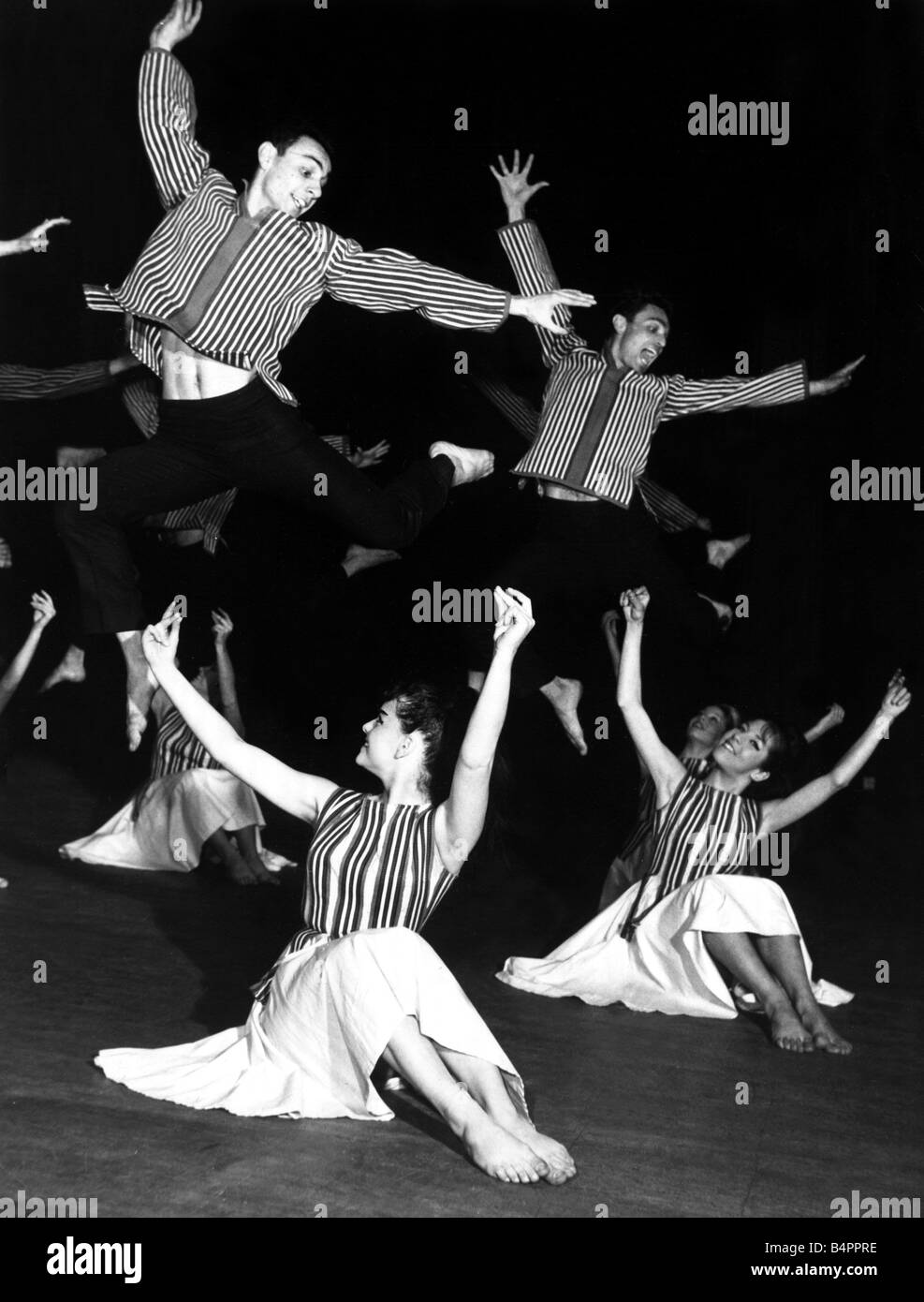 The Karmon Israeli dancers rehearsing six boys and six girls dancing barefoot in highly coloured costumes March 1962 Stock Photo
