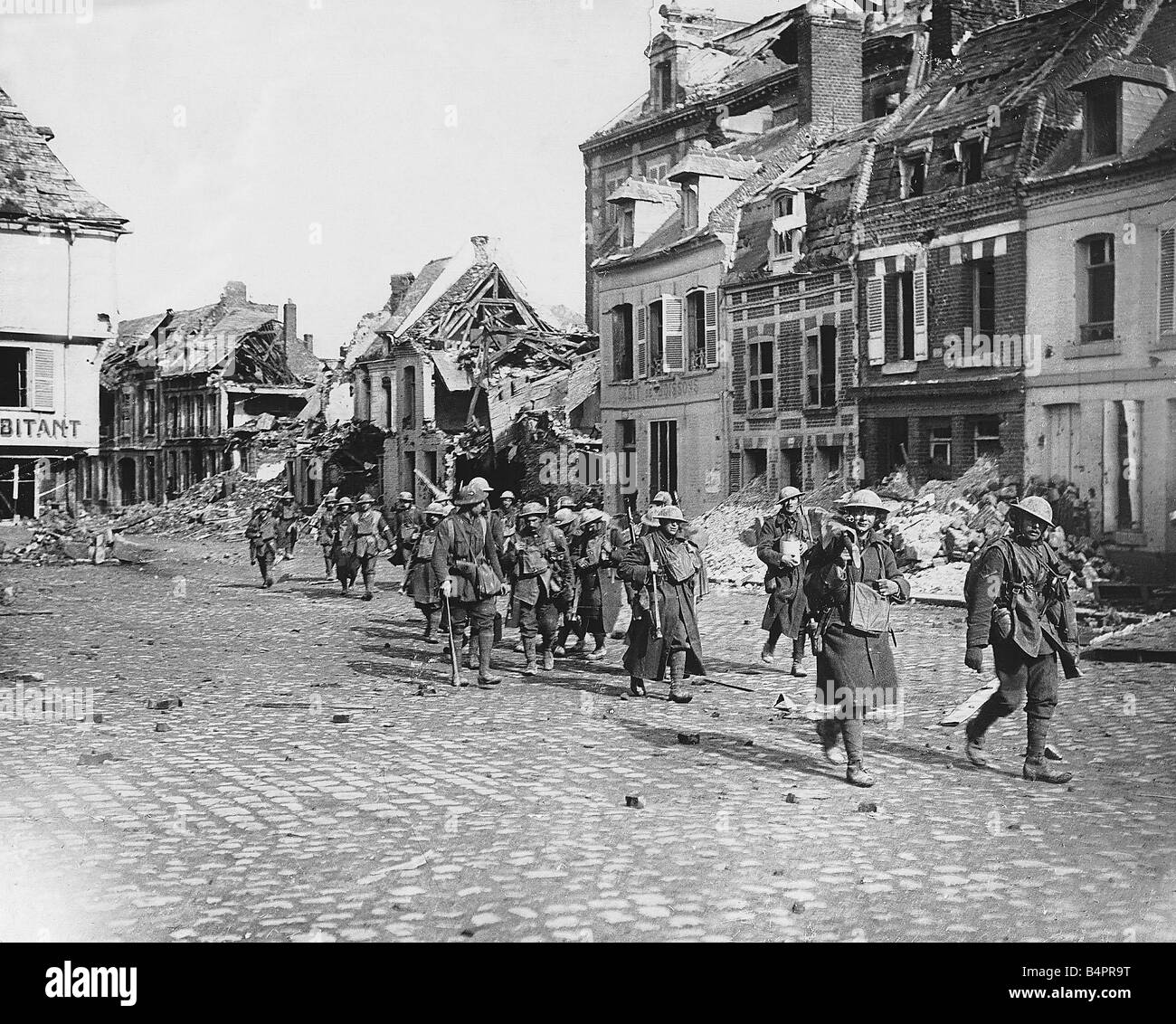 British soldiers march into Peronne after its capture 1917 during World War One Stock Photo