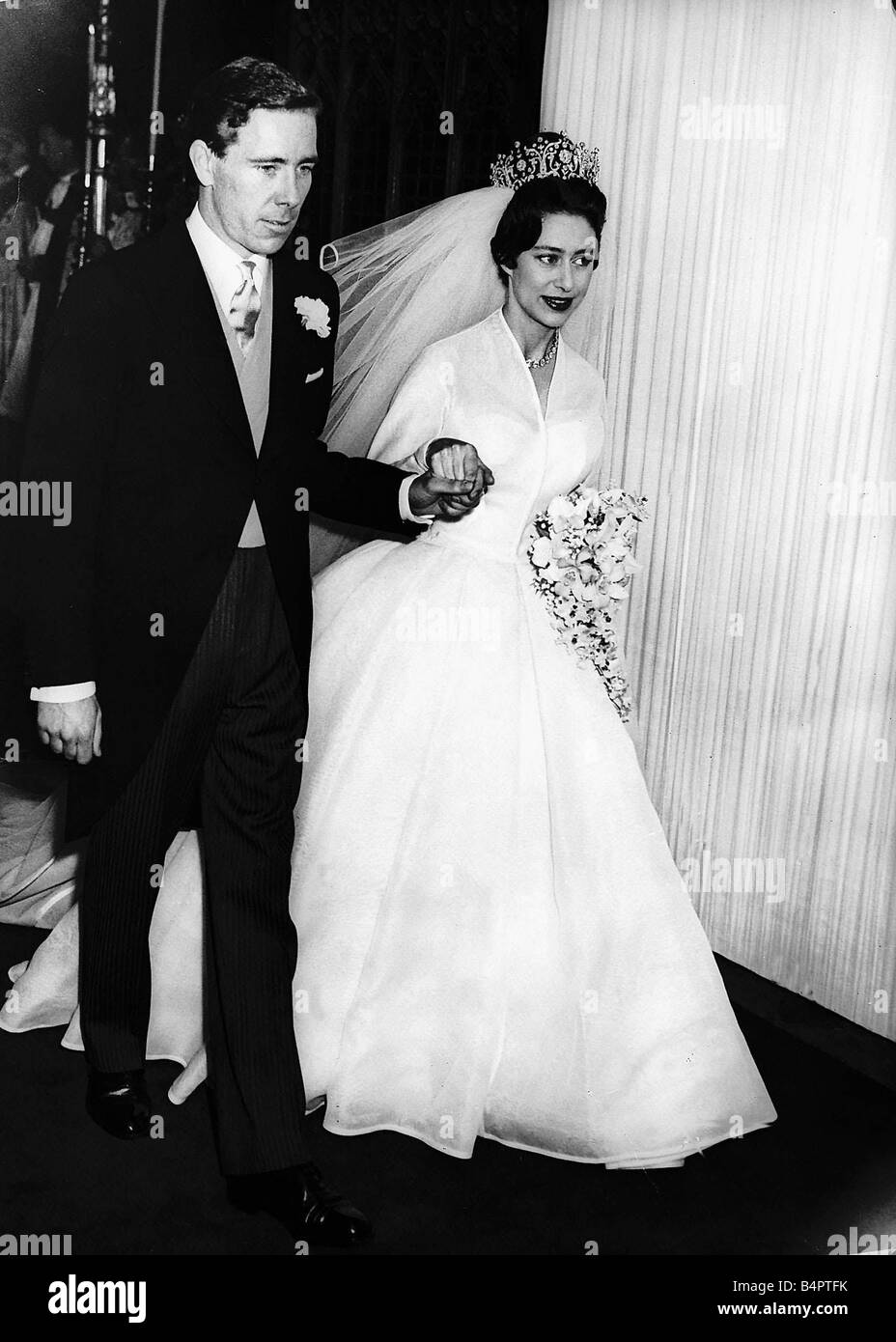 Princess Margaret and Lord Snowdon May 1960 holding hands as they leave Westminster Abbey after their Royal wedding weby Stock Photo