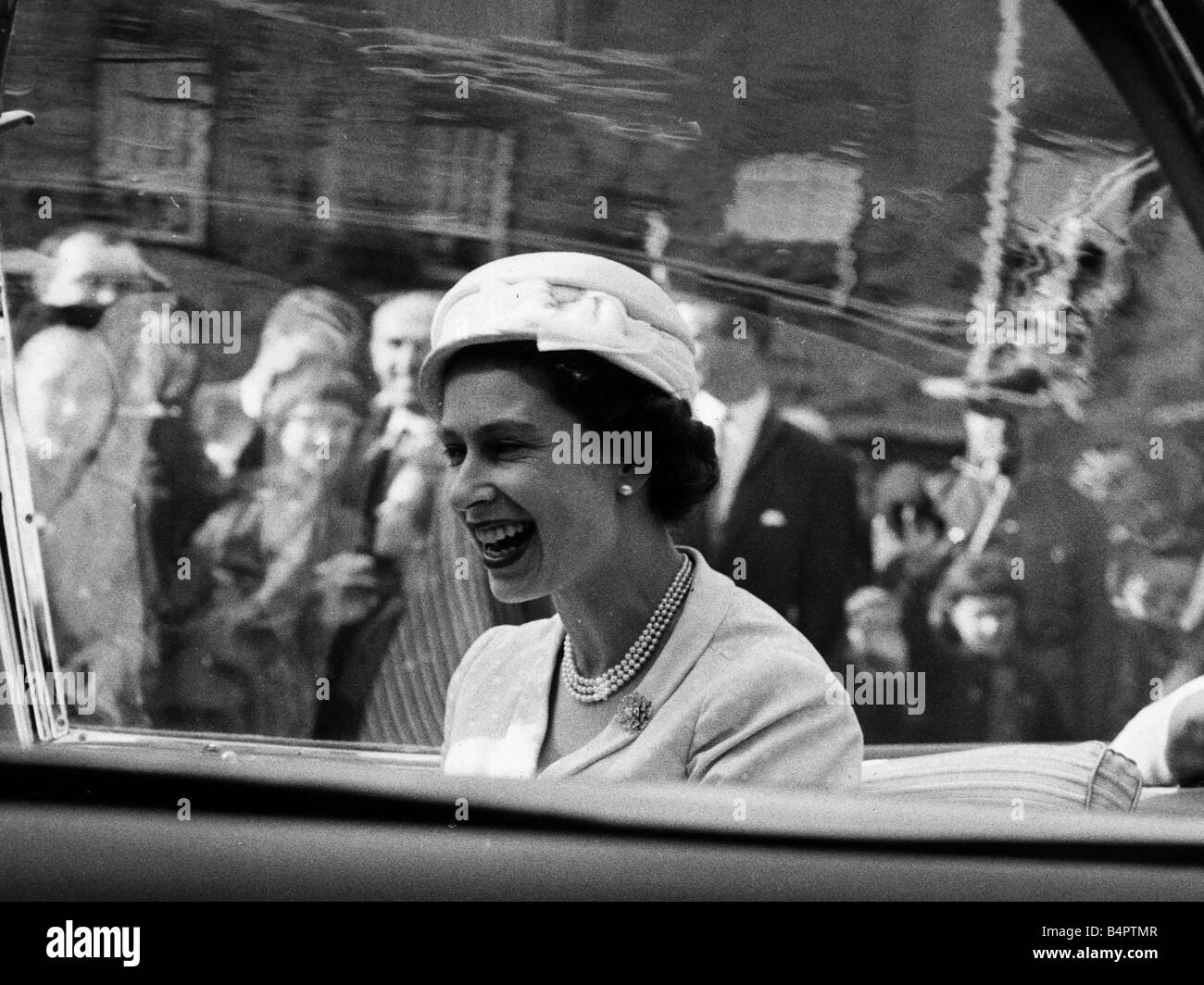 Queen Elizabeth II Visits 1959 Tour of Canada Driving through the town