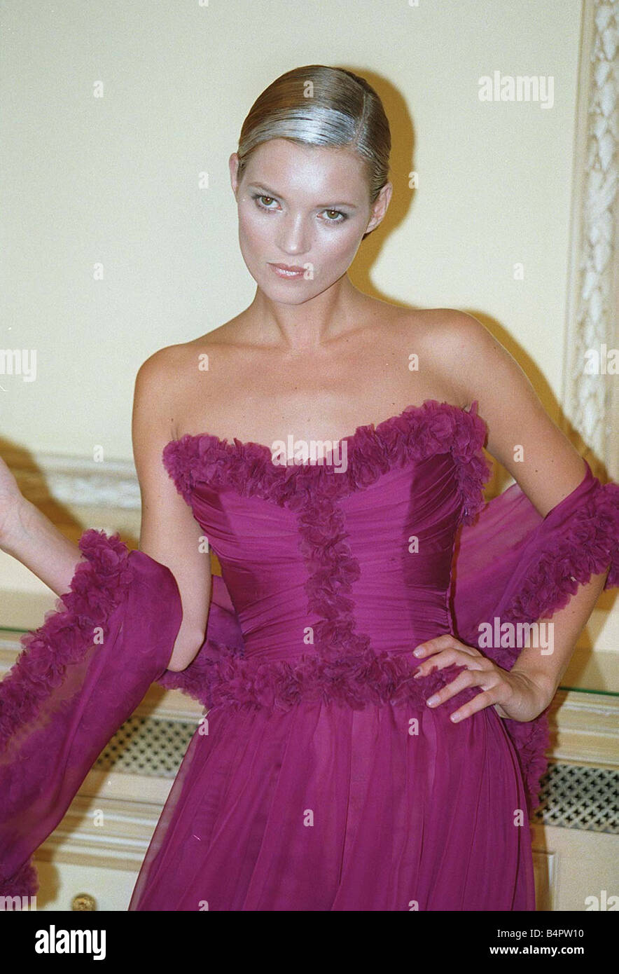 Kate Moss models Chanel at Paris fashion show Purple strapless ball gown  white streak in hair Stock Photo - Alamy