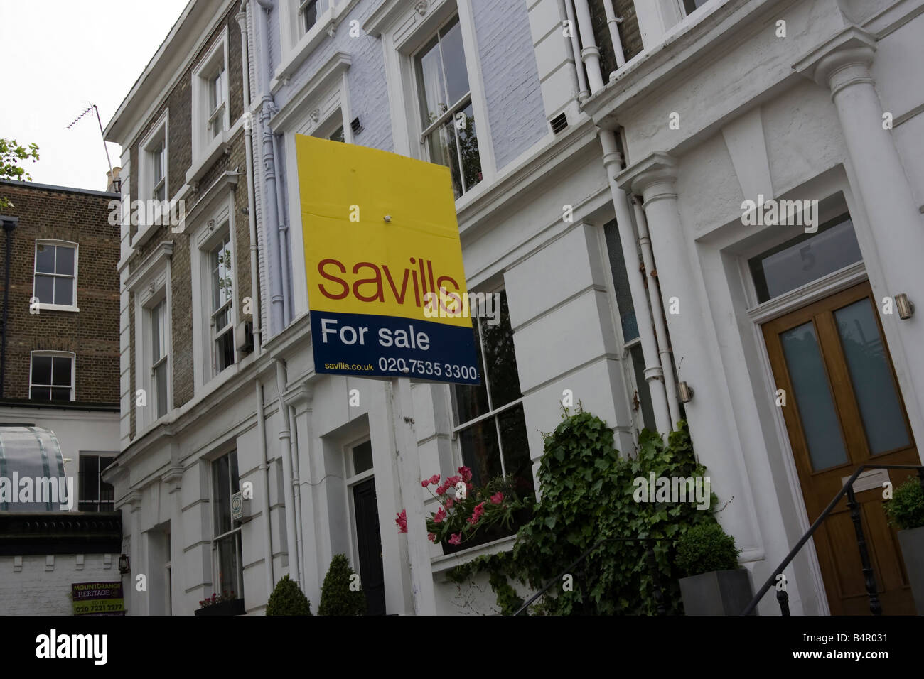 Savills for sale board Portland Road Notting Hill Royal Borough of