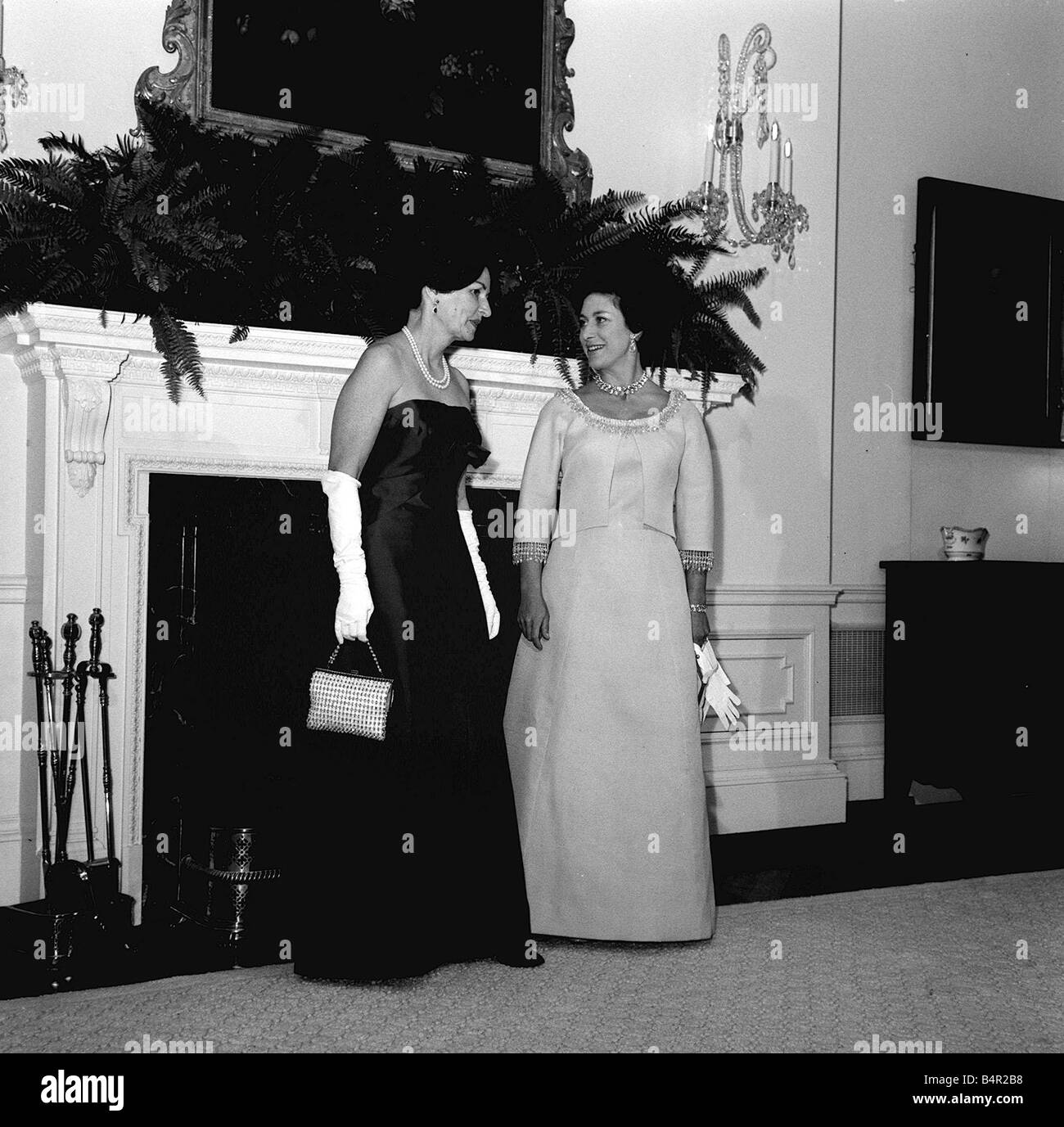 Princess Margaret November 1965 with President Lyndon B Johnson s wife Ladybird Johnson at a reception at the White house in Washington USA Stock Photo