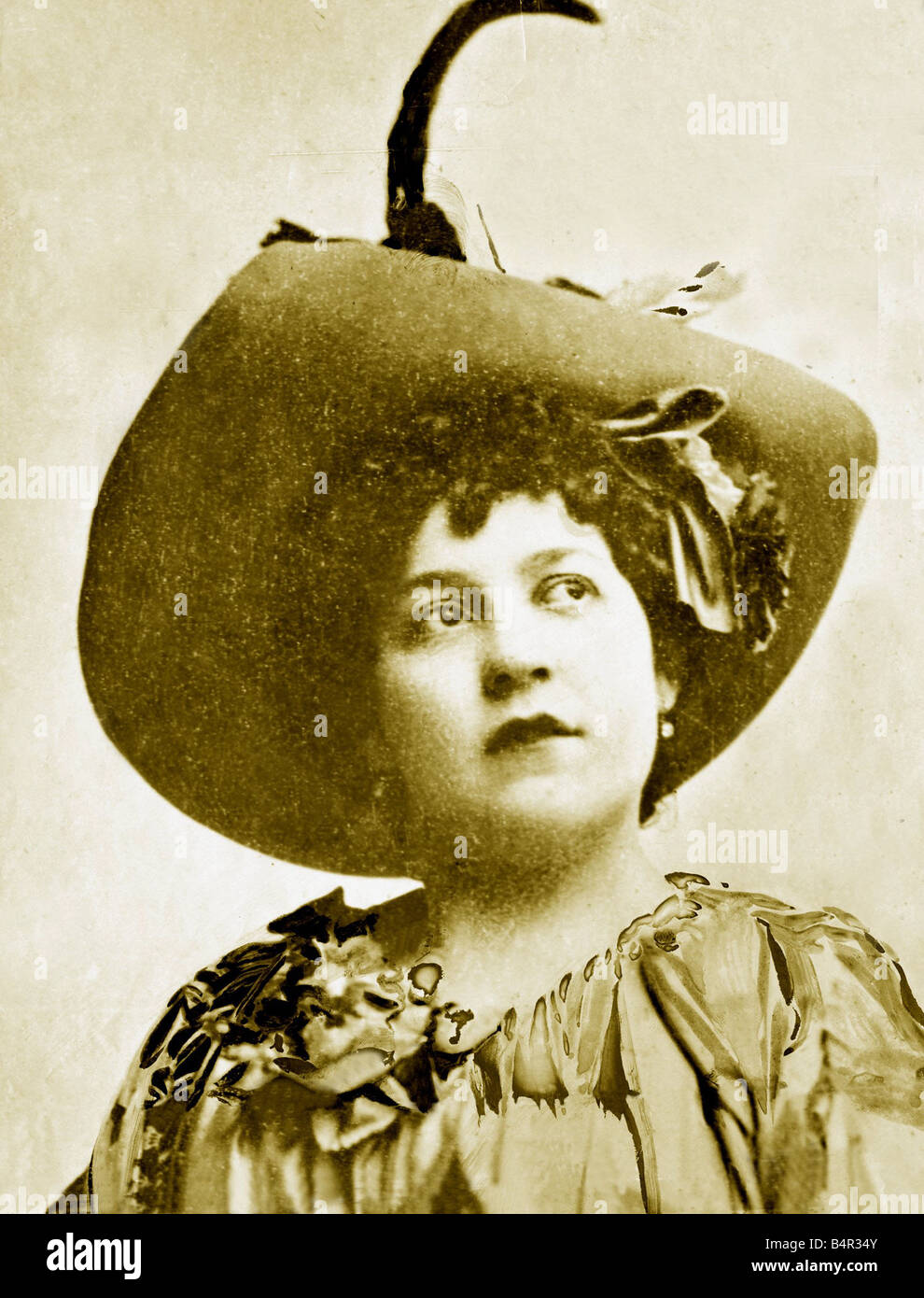 A photograph pf the late Mrs Crippen as she appeared on stage she was professionally known as Belle Elmore Dr Hawley Crippen during their trial for murder Dr Crippen was hanged in Pentonville Prison London after being convicted of murdering his wife Mrs Crippen as she appeared on stage she was professionally known as Belle Elmore in 1910 After killing her and hiding her remains in the cellar of his London home the American born doctor tried to escape to Canada with his lover Ethel Le Neve who was dressed as a boy But Crippen was caught after Henry Kendall the sharp eyed captain of the SS Stock Photo