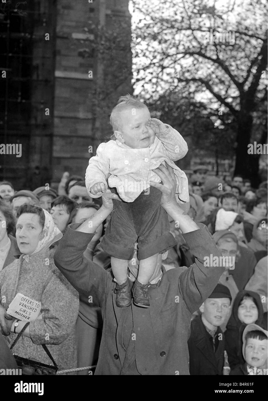 Crying child in waiting to see the Queen in Carlisle in 1958 Stock Photo