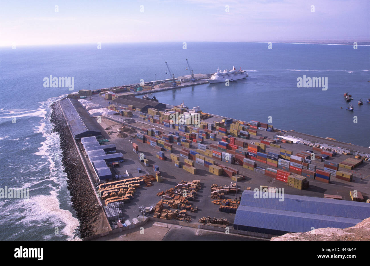 Containers in port, cruise ship in background, Arica , Chile Stock