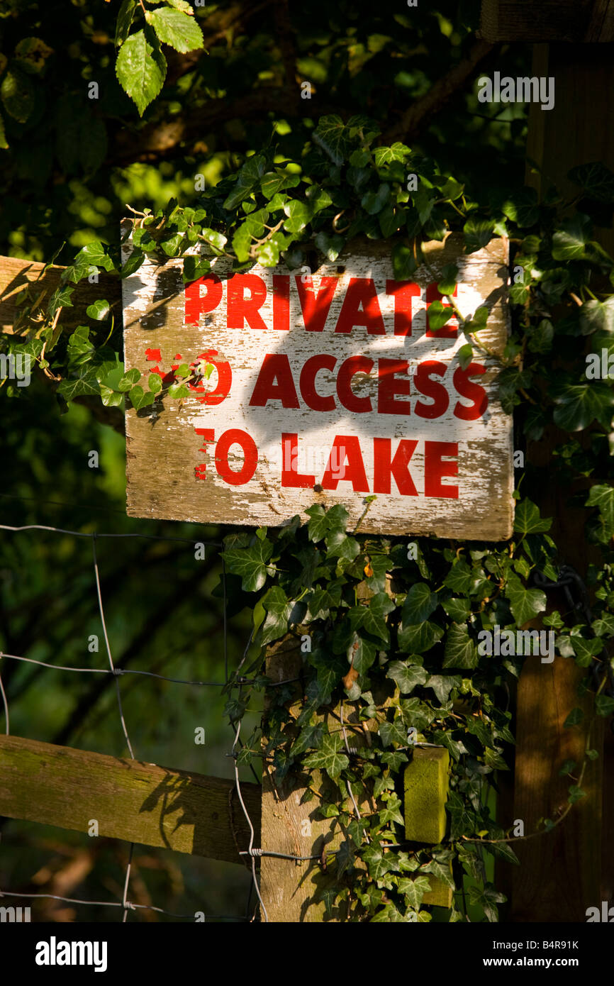 Old No Access to lake sign in the woods Stock Photo