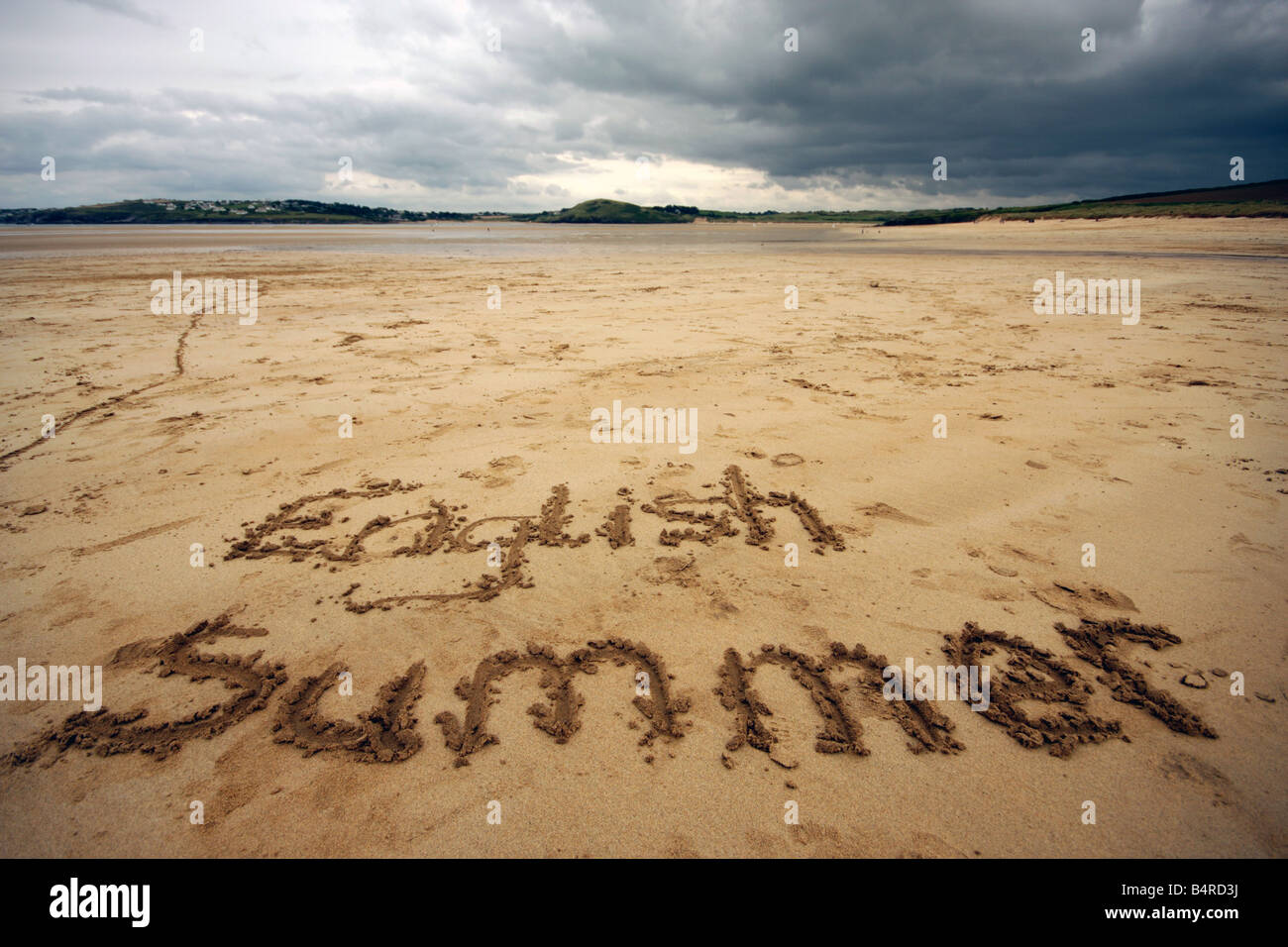 Engish Summer written on the sand at Harbour Cove near Padstow Cornwall UK Stock Photo