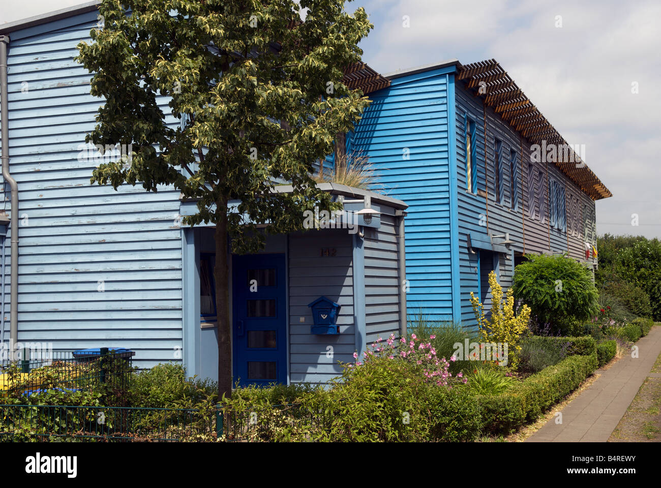 View of Low impact housing, with solar energy, green roofs and rainwater ...
