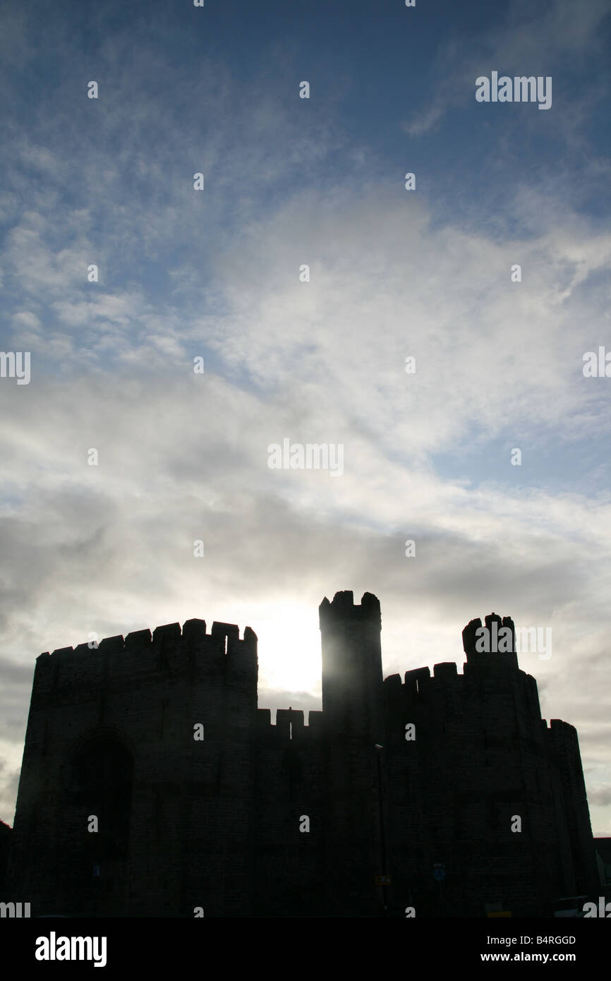 caernarfon castle and dark sky, north wales Stock Photo Alamy