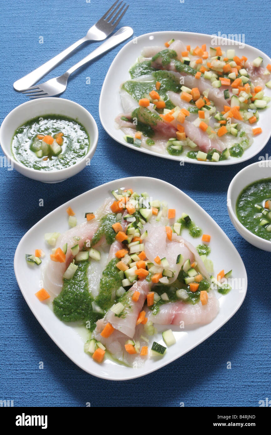 Fish Riciolla Carpaccio of Ricciola fish with Vegetable's pesto sauce, Italy Stock ...