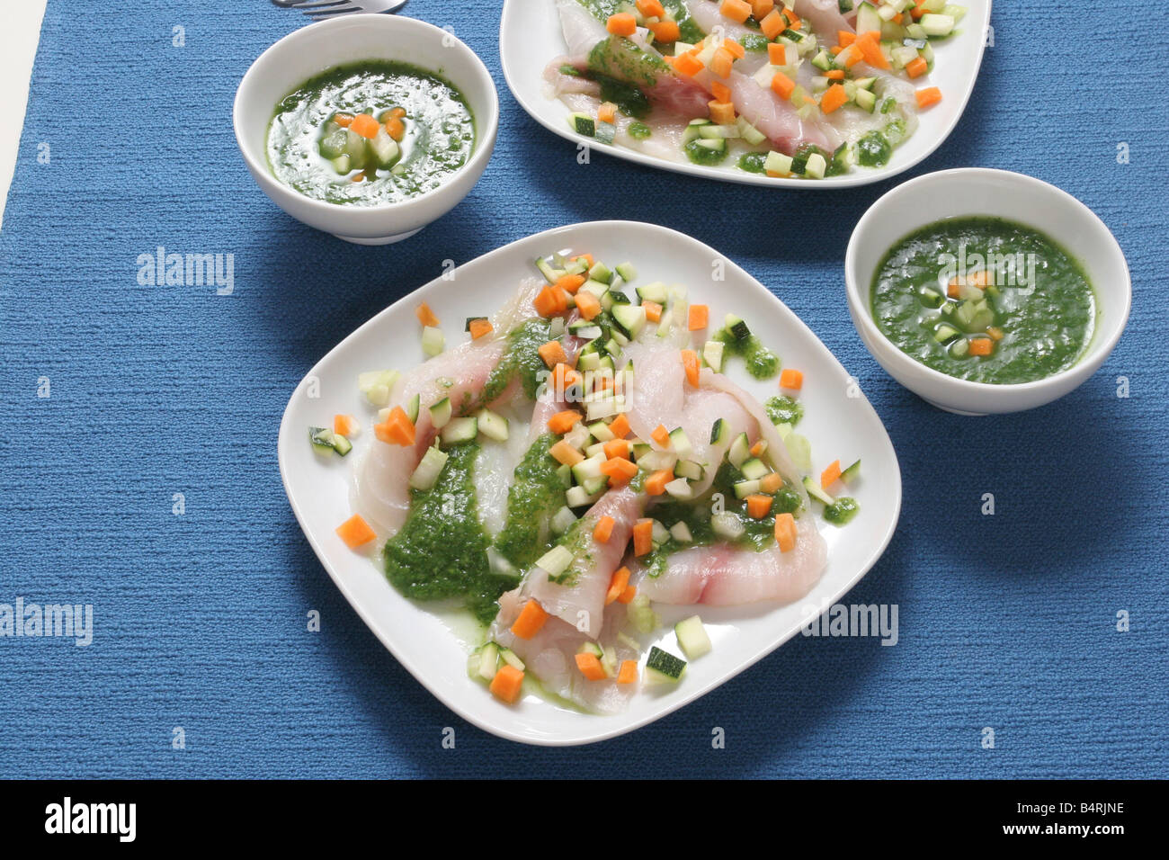 Fish Riciolla Carpaccio of Ricciola fish with Vegetable's pesto sauce, Italy Stock ...