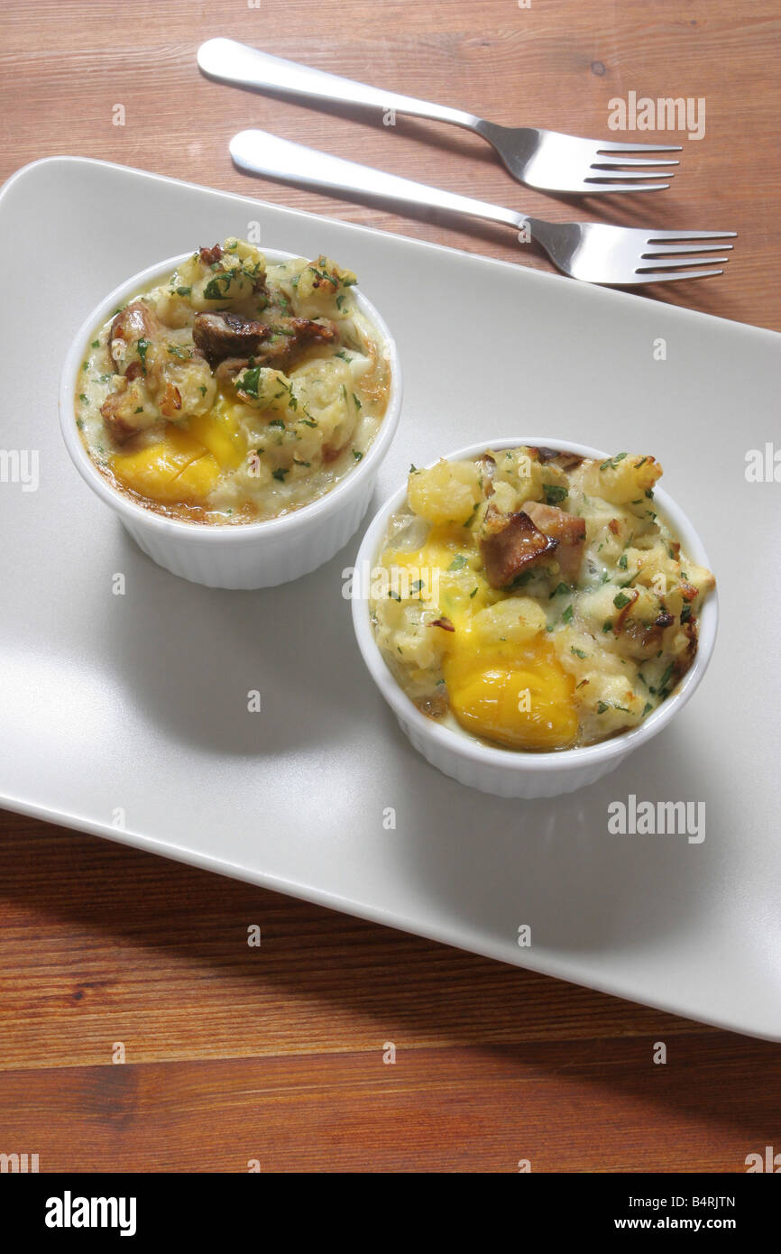 Cocotte of eggs, potatoes, mushrooms, Italy Stock Photo Alamy