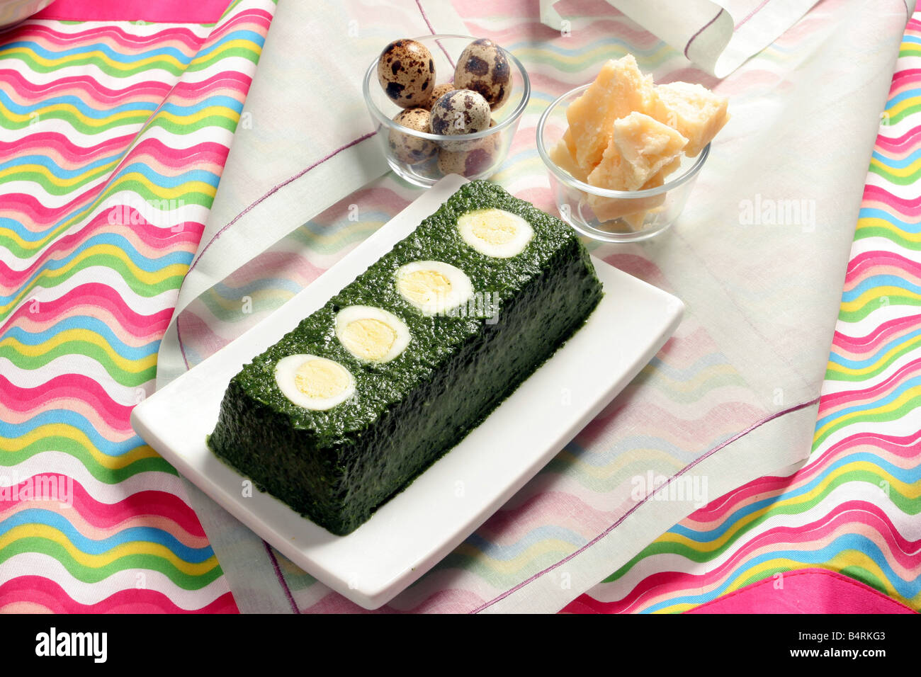 Aspic made with quail's eggs and spinaches Italy Stock Photo Alamy