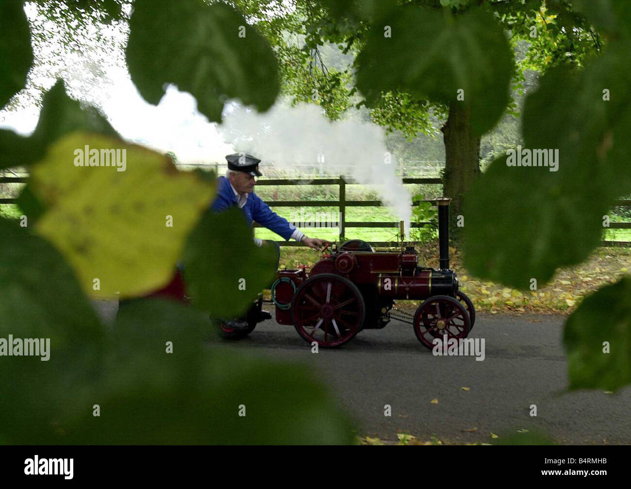 Ronald Chilton drives his 4 Tasker steam engine through the grounds of