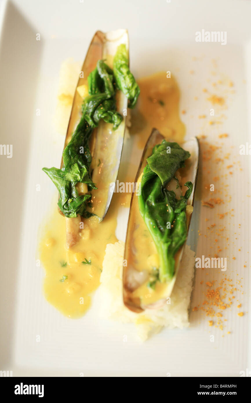 Grilled razor-clams in sweet spiced sauce  Il Pagliaccio restaurant  Via dei Banchi Vecchi 129a  Rome  Lazio  Italy Stock Photo