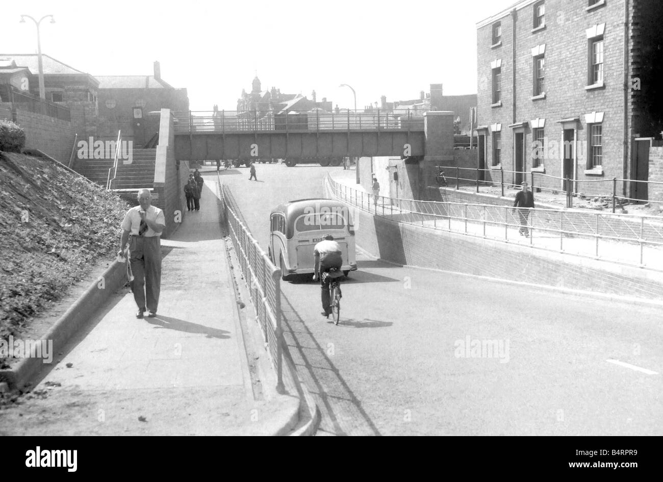 Pedestrians walking under a viaduct in Stourbridge 1958 Stock Photo Alamy