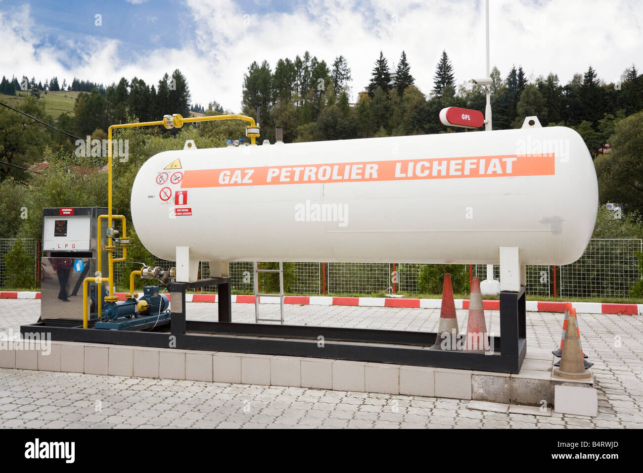 Romania Europe Large tank of Liquid Petroleum Gas LPG on filling station forecourt Stock Photo