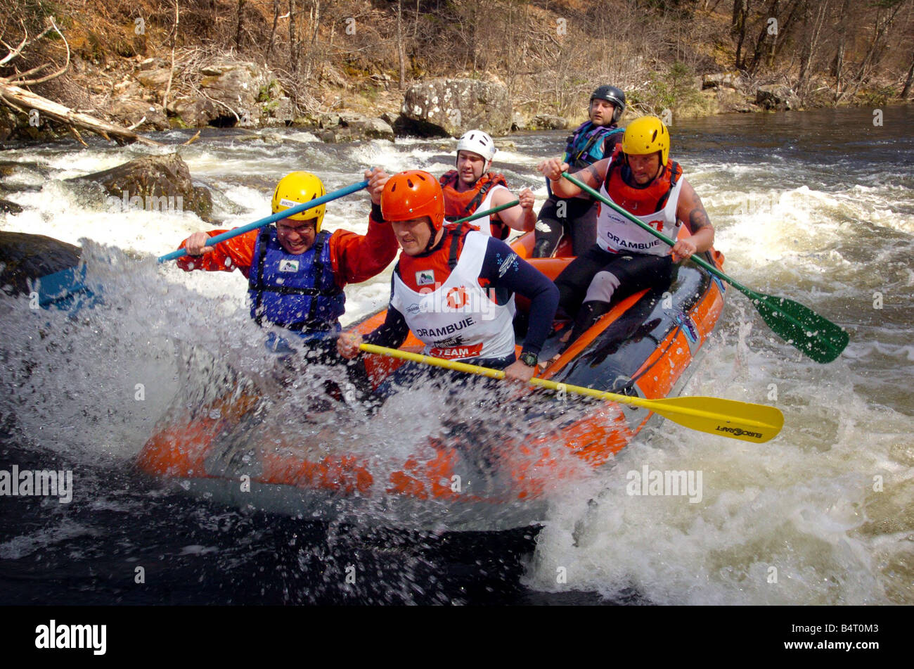 Team America James Moncur Centre Mike Watts John Richardson and James Ballard seen here taking part in the white water rafting section of The Drambuie Pursuit Adventure Race Stock Photo