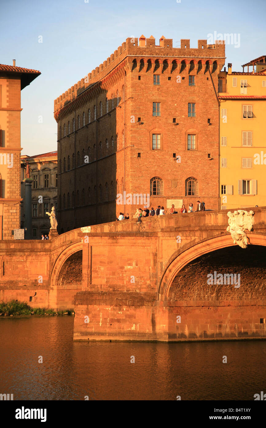 Santa Trinitï¿½ bridge and Ferragamo palace  Florence  Tuscany  Italy Stock Photo