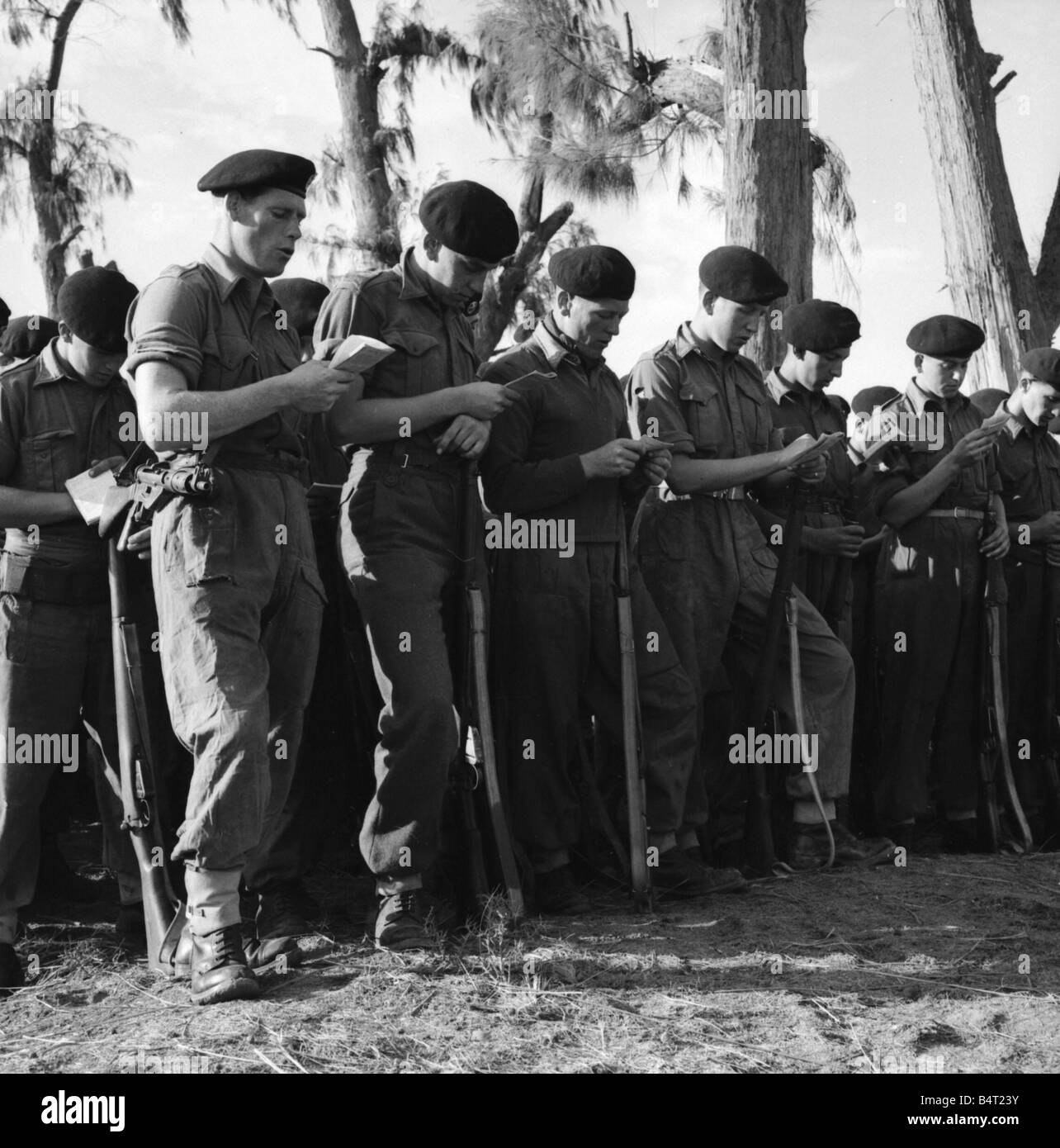 Suez Crisis 1956 Soldiers of the York and Lancaster Regiment B and D Company 12th Battalion participating in a communion service given by Padre Raymond Morton at the British front line at El Cap Stock Photo