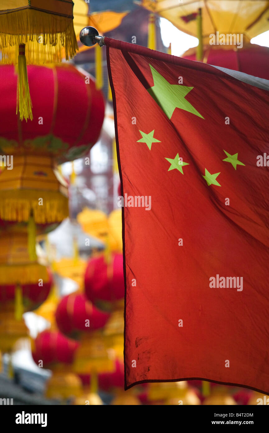 China, Shanghai, Old Town, Yuyuan Gardens and Bazaar, Chinese Flag and Festive Lanterns Stock Photo