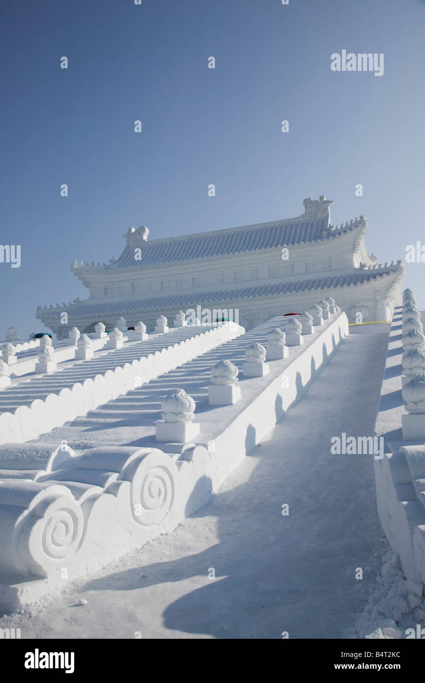 China, Heilongjiang, Harbin, Ice and Snow Festival, Forbidden City made of snow and ice slide Stock Photo