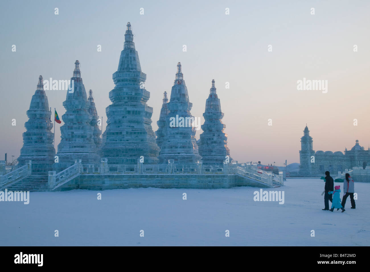 China, Heilongjiang, Harbin, Haerbin Ice and Snow World Festival, Ice Towers at Sunset Stock Photo