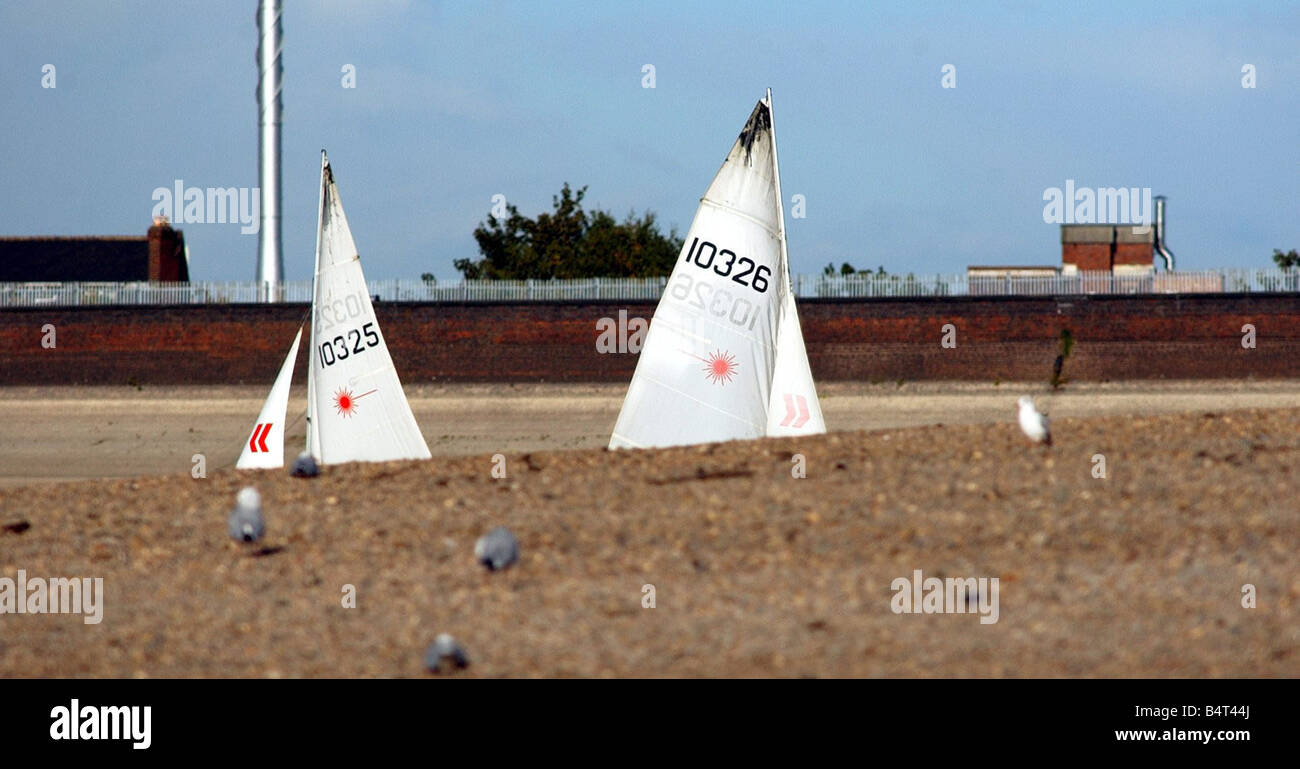 Sailors at Edgbaston Reservoir very short of water after a summer without rain Stock Photo