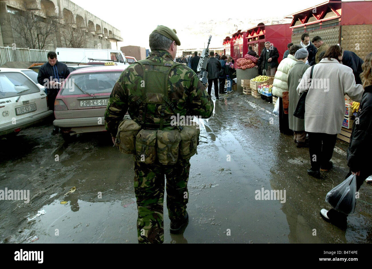 Queens Royal Hussars duty in Kosovo as apart of the KFOR peace keeping mission Soldiers on patrol in the market palce Stock Photo