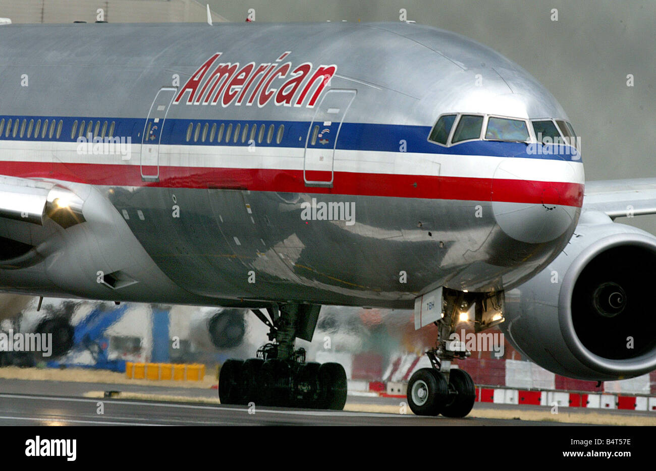 An American Airlines Boeing 767 prepares to take off from Heathrow airport where over 50 percent of flights were cancelled after the government and airport authorities brought in tougher security measures after an aborted bomb plot August 2006 Stock Photo