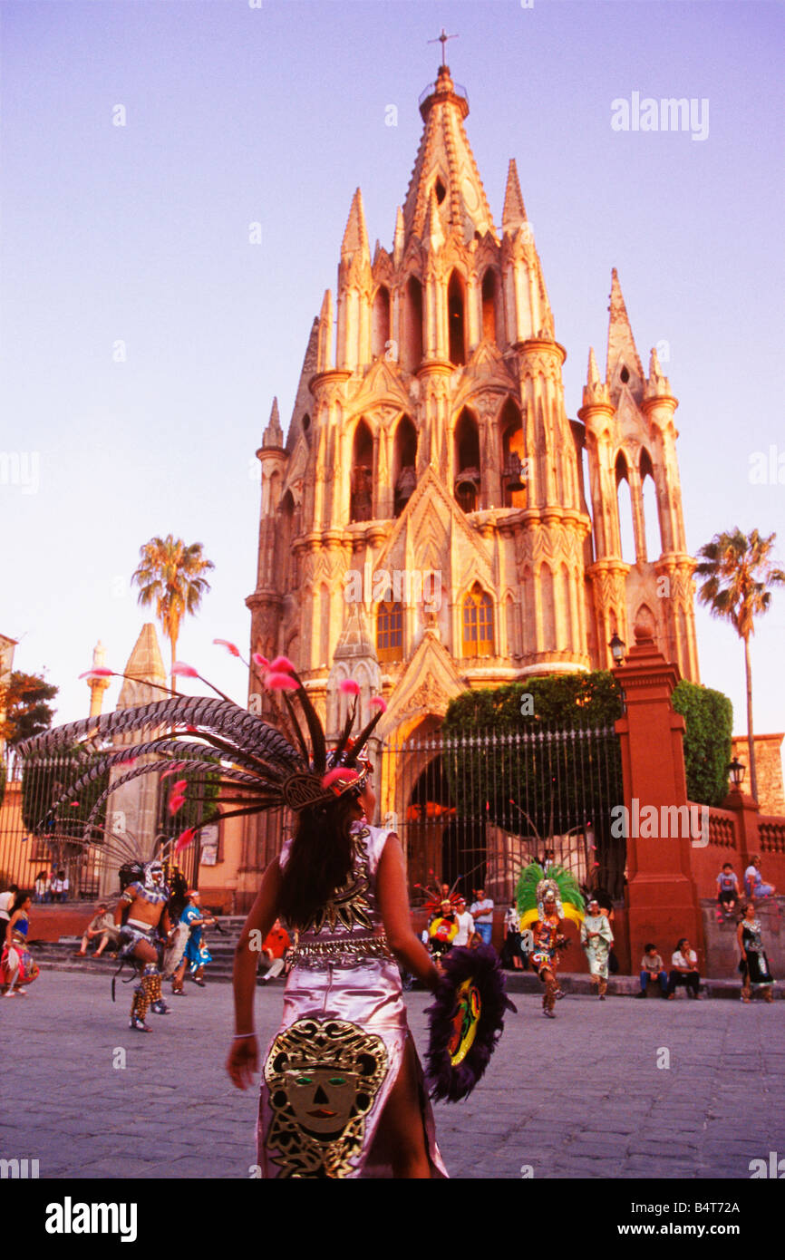 Aztec Dancers perform in front of Parroquia de San Miguel Arcangel San ...
