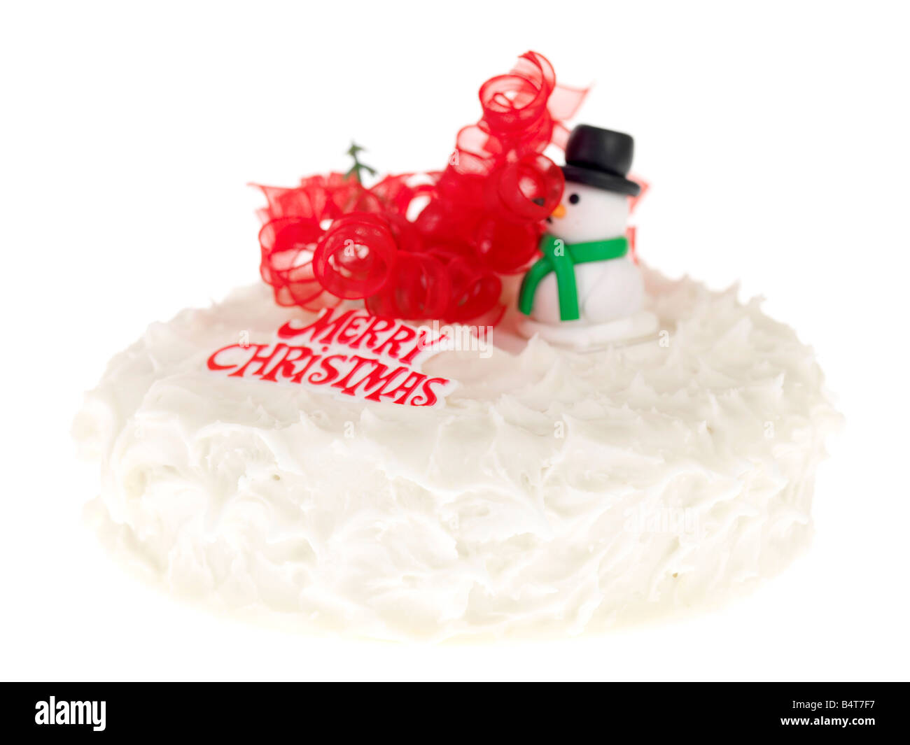 Fresh Festive Rich Fruit Decorated And Iced Christmas Cake Isolated White Background With No People and A Clipping Path Stock Photo