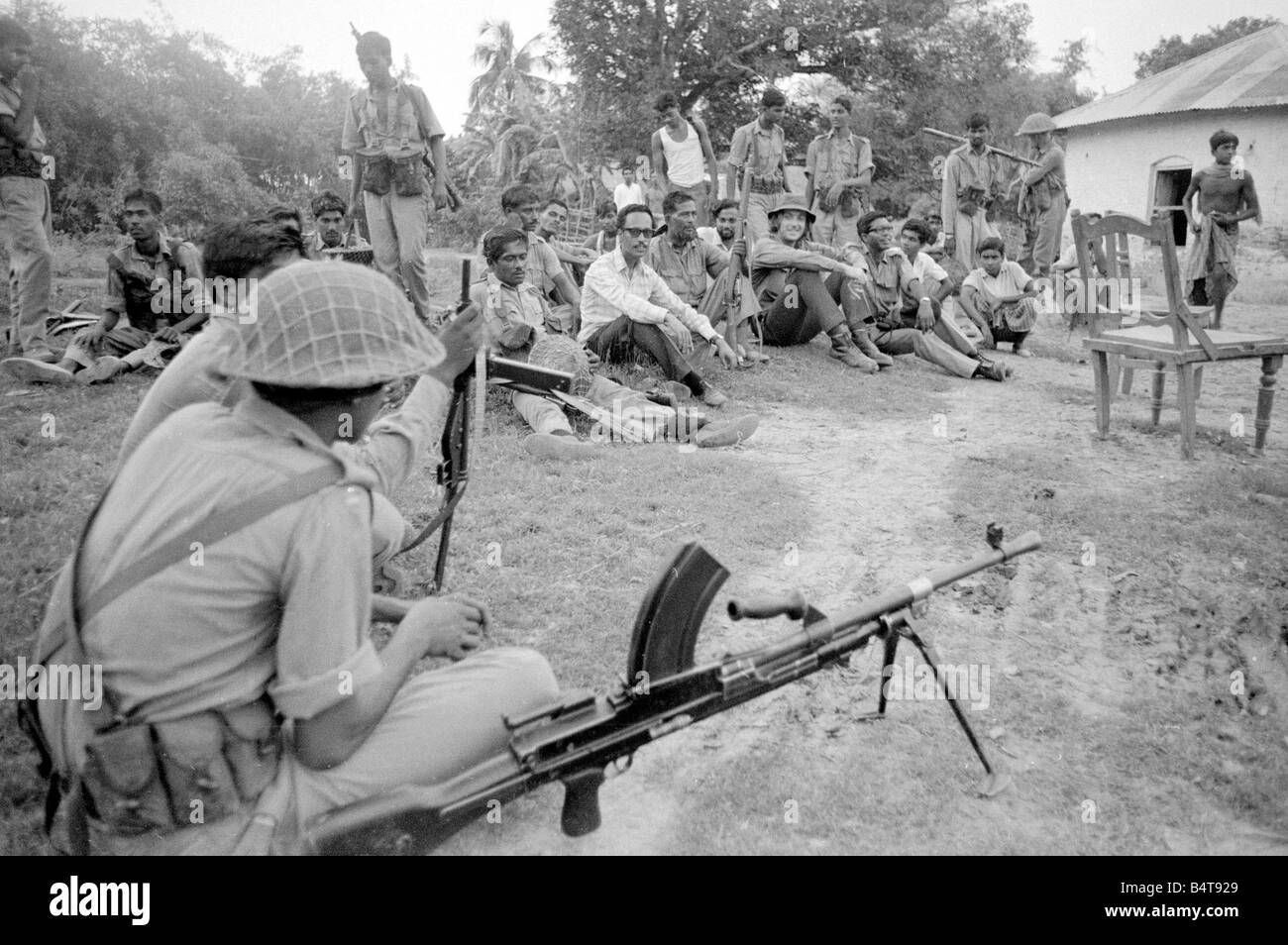 Pakistan - Bangladesh Civil War June 1971;A large area of East Pakistan territory is under the control of the Bangladesh Freedom Fighters. These pictures were taken on patrol with an operational unit whose camp is in the Jungle just inside the Indian border.;Our Picture Shows: John Pilger with troops on Patrol in East Pakistan Stock Photo